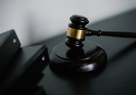 Legal documents and gavel representing tenant screening importance